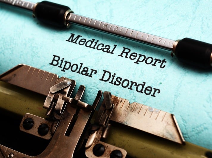 Causes of Bipolar Disorder. Typewrite with the word "Medical Report Bipolar Disorder" 